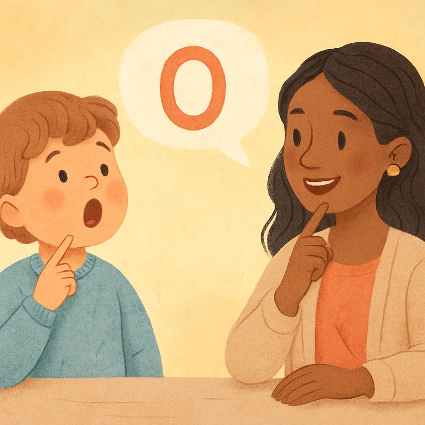 Child smiling while learning new words in a speech therapy session.