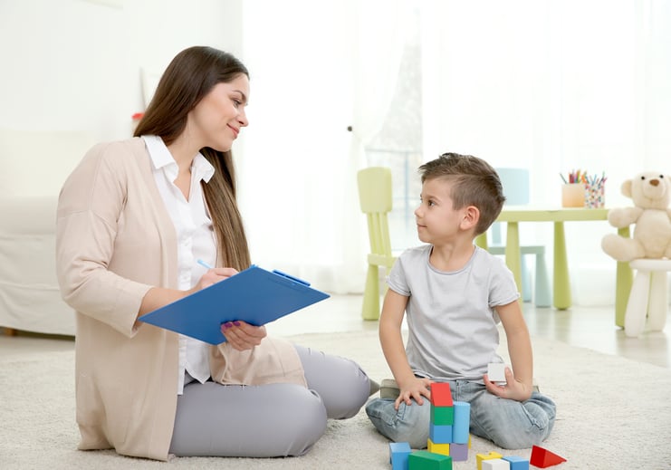 young-child-psychologist-working-with-little-boy